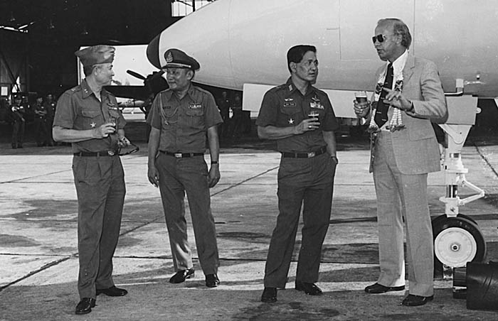 1979, Bangkok RTAF Base.  Chatting with senior RTAF officers on first Merlin 4A delivery.